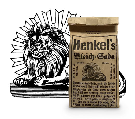 Packung mit Henkel’s Bleich-Soda und Firmenlogo mit Löwe im Strahlenkranz